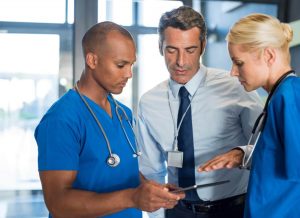 Three Medical Consultant Conducting a Meeting